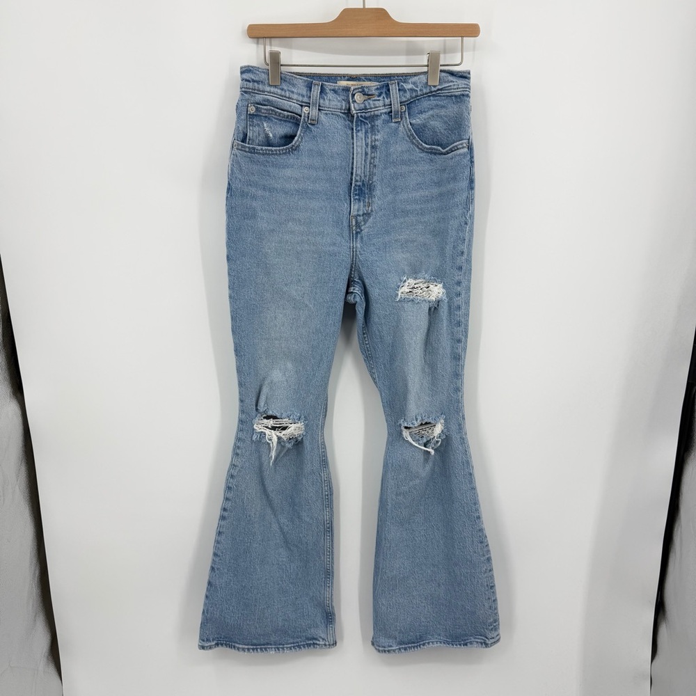 Levi's Premium 70s High‎ Flare jeans, size 28 distressed knee holes